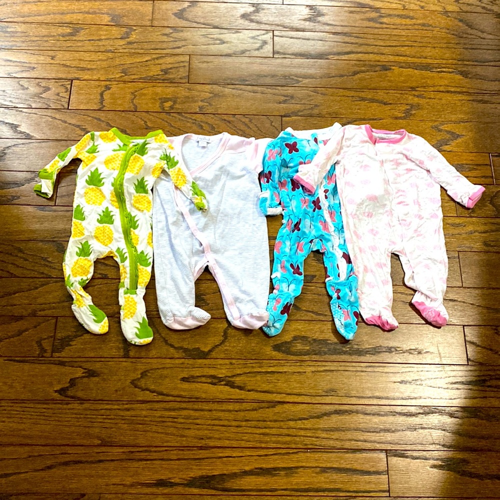 Four Designer Baby Onesies